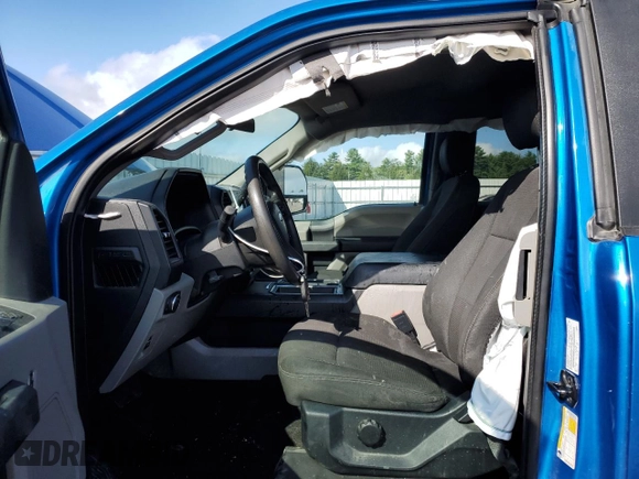2019 Ford F-150 XL with VIN 1FTEX1EP2KKF20835, listed as a Copart auction lot 70089304 with 87,402 mi miles and Salvage title. Bid and sale history available at DreamBid. Image 7.
