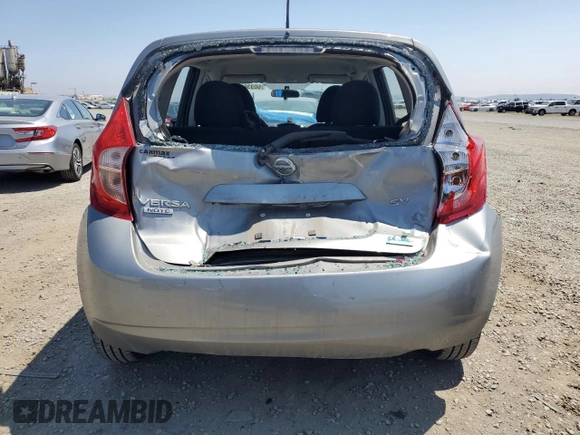 2015 Nissan Note SR with VIN 3N1CE2CP9FL418008, listed as a Copart auction lot 60336955 with 104,190 mi miles and Salvage title. Bid and sale history available at DreamBid. Image 6.