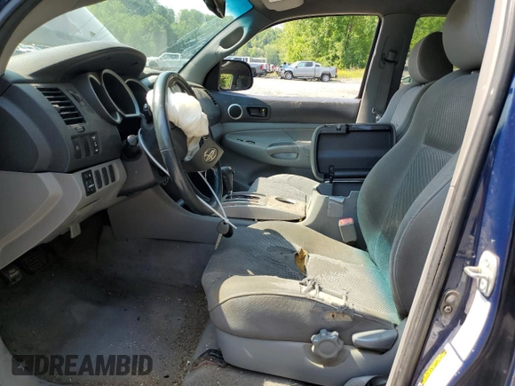 2007 Toyota Tacoma with VIN 5TEMU52N07Z340660, listed as a Copart auction lot 60367795 with 194,719 mi miles and Salvage title. Bid and sale history available at DreamBid. Image 7.