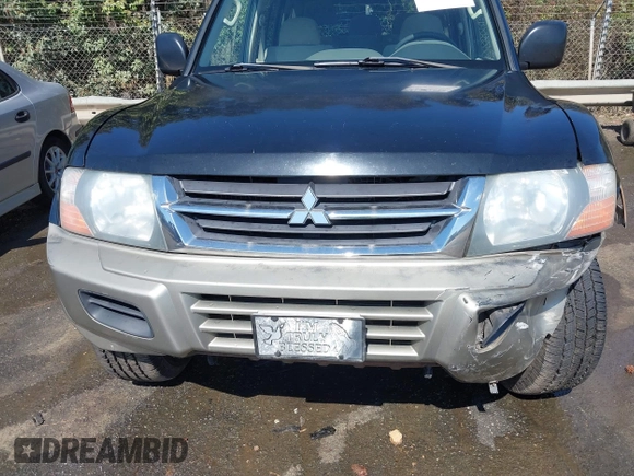 2002 Mitsubishi Montero XLS z VIN JA4MW31R52J070132, wystawiony jako IAAI lot #41782522 z przebiegiem 92 575 mil mil oraz . Historia ofert i sprzedaży dostępna na DreamBid. Obrazek 17.