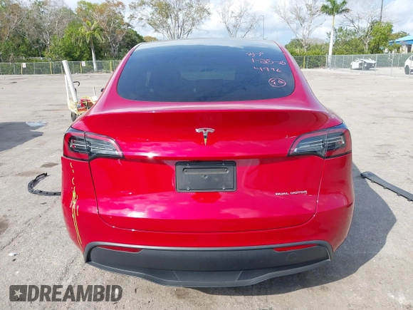 2023 Tesla Model Y Long Range with VIN 7SAYGDEE1PA154996, listed as a IAAI auction lot 41472595 with 24,861 mi miles and . Bid and sale history available at DreamBid. Image 16.