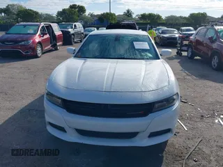2019 Dodge Charger SXT with VIN 2C3CDXBG2KH730063, listed as a IAAI auction lot 41641913 with 47,744 mi miles. Bid and sale history available at carsss.com. Image 6.