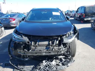 2023 Volkswagen ID.4 Pro z VIN 1V2DNPE85PC028748, wystawiony jako IAAI lot #41348983 z przebiegiem 7 434 mil mil oraz . Historia ofert i sprzedaży dostępna na DreamBid. Obrazek 12.