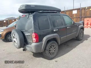 2002 Jeep Liberty Sport with VIN 1J4GL48K02W313000, listed as a IAAI auction lot 41837671 with 168,362 mi miles. Bid and sale history available at carsss.com. Image 4.