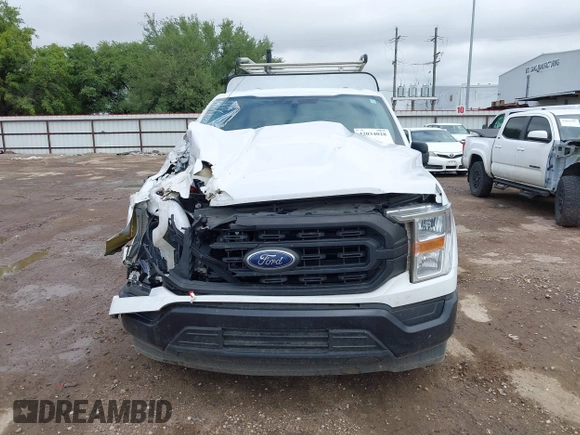 2021 Ford F-150 XL with VIN 1FTMF1CB4MKD85219, listed as a IAAI auction lot 42034028 with 115,415 mi miles and . Bid and sale history available at DreamBid. Image 12.