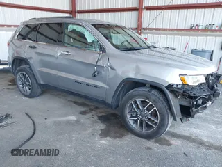 2021 Jeep Grand Cherokee 80th Anniversary z VIN 1C4RJFBG0MC504070, wystawiony jako IAAI lot #42052444 z przebiegiem 41 117 mil mil oraz . Historia ofert i sprzedaży dostępna na DreamBid. Obrazek 1.