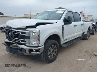 2024 Ford Super Duty F-250 SRW XL with VIN 1FT7W2BT2RED24809, listed as a IAAI auction lot 42186884 with 82,971 mi miles. Bid and sale history available at carsss.com. Image 2.