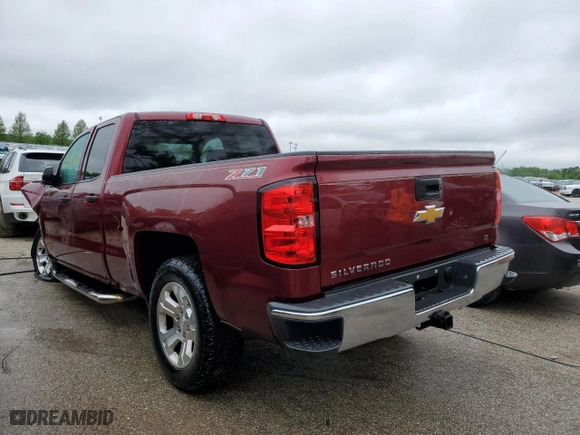 2014 Chevrolet Silverado 1500 LT with VIN 1GCRCREC1EZ322817, listed as a Copart auction lot 52605334 with 212,869 mi miles and Salvage Title. Bid and sale history available at carsss.com. Image 2.