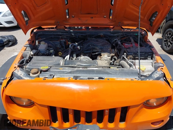 2012 Jeep Wrangler Unlimited Sport RHD with VIN 1C4BJWKGXCL221613, listed as a IAAI auction lot 42327004 with 129,375 mi miles and . Bid and sale history available at DreamBid. Image 10.