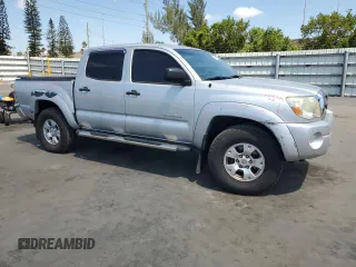 2010 Toyota Tacoma PreRunner with VIN 5TEJU4GN1AZ702394, listed as a Copart auction lot 54943375 with 117,625 mi miles and Salvage Title. Bid and sale history available at DreamBid. Image 4.