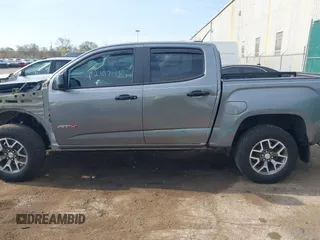 2022 GMC Canyon 4WD AT4 z VIN 1GTG6FEN2N1101756, wystawiony jako IAAI lot #42107148 z przebiegiem 37 900 mil mil oraz . Historia ofert i sprzedaży dostępna na DreamBid. Obrazek 15.