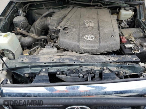 2012 Toyota Tacoma z VIN 3TMLU4ENXCM082978, wystawiony jako Copart lot #60069475 z przebiegiem 169 533 mil mil oraz Szkoda całkowita • Salvage title. Historia ofert i sprzedaży dostępna na DreamBid. Obrazek 11.