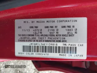 2014 Mazda 3 S Touring with VIN JM1BM1L36E1139818, listed as a IAAI auction lot 42129839 with 134,397 mi miles and . Bid and sale history available at DreamBid. Image 9.