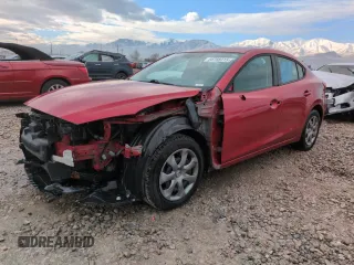2014 Mazda 3 i SV with VIN JM1BM1T78E1185394, listed as a Copart auction lot 88788315 with 106,915 mi miles and Salvage Title. Bid and sale history available at DreamBid. Image 1.
