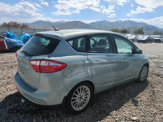 2014 Ford C-Max SEL z VIN 1FADP5CU9EL512960, wystawiony jako Copart lot #58022705 z przebiegiem 78 107 mil mil oraz Tytuł czysty. Historia ofert i sprzedaży dostępna na DreamBid. Obrazek 3.