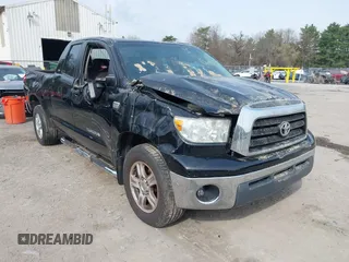 2007 Toyota Tundra SR5 z VIN 5TFBT54117X005726, wystawiony jako IAAI lot #42105716 z przebiegiem 84 828 mil mil oraz . Historia ofert i sprzedaży dostępna na DreamBid. Obrazek 6.