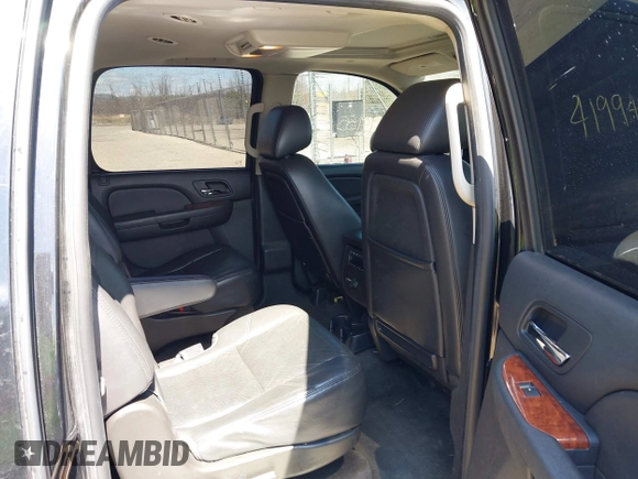 2010 Chevrolet Suburban LTZ with VIN 1GNUKKE39AR106851, listed as a IAAI auction lot 41994155 with 148,776 mi miles. Bid and sale history available at carsss.com. Image 8.