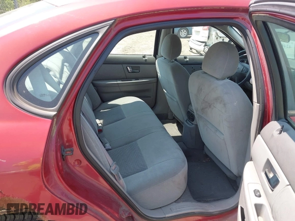 2003 Ford Taurus SE Standard with VIN 1FAFP53UX3G124702, listed as a IAAI auction lot 42463606 with 129,874 mi miles and . Bid and sale history available at DreamBid. Image 8.