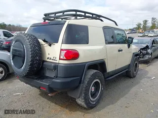 2010 Toyota FJ Cruiser with VIN JTEBU4BF1AK095319, listed as a IAAI auction lot 41721065 with 126,262 mi miles. Bid and sale history available at carsss.com. Image 4.