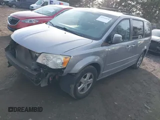 2013 Dodge Grand Caravan SXT with VIN 2C4RDGCG8DR551723, listed as a IAAI auction lot 41510574 with 183,432 mi miles and . Bid and sale history available at DreamBid. Image 2.