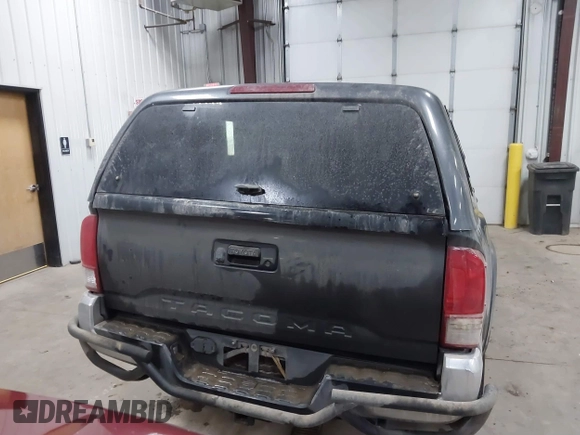 2016 Toyota Tacoma SR5 with VIN 3TMDZ5BNXGM009423, listed as a IAAI auction lot 41008068 with 107,426 mi miles and . Bid and sale history available at DreamBid. Image 16.