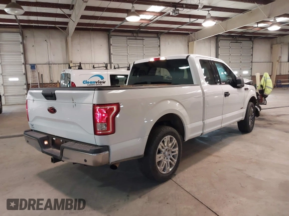 2015 Ford F-150 XL with VIN 1FTEX1CG5FKD31637, listed as a IAAI auction lot 41607827 with 201,278 mi miles. Bid and sale history available at carsss.com. Image 4.