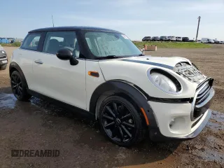 2016 MINI Hardtop with VIN WMWXP5C5XG2D15482, listed as a Copart auction lot 59652125 with 99,066 mi miles and Salvage title. Bid and sale history available at DreamBid. Image 4.