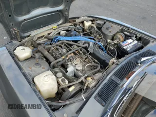1983 Datsun 280ZX z VIN JN1CZ06S1DX700637, wystawiony jako Copart lot #53893855 z przebiegiem 93 909 mil mil oraz Tytuł czysty. Historia ofert i sprzedaży dostępna na DreamBid. Obrazek 11.