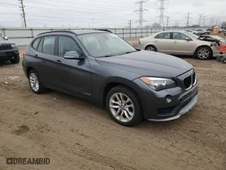 2015 BMW X1 xDrive28i with VIN WBAVL1C52FVY26870, listed as a Copart auction lot 43710555 with 0 mi miles and Salvage Title. Bid and sale history available at carsss.com. Image 4.