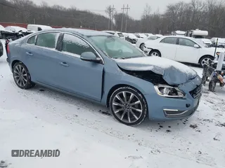2017 Volvo S60 Inscription z VIN LYV402TK3HB127947, wystawiony jako IAAI lot #41235145 z przebiegiem 124 034 mil mil oraz . Historia ofert i sprzedaży dostępna na DreamBid. Obrazek 1.