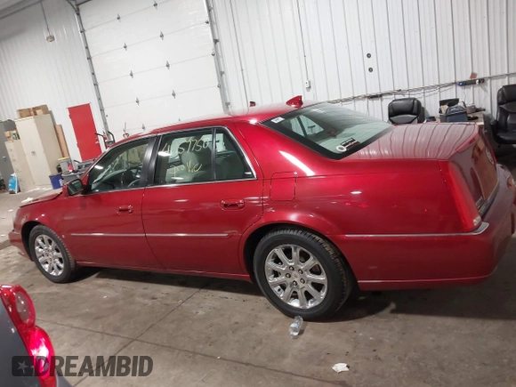 2009 Cadillac DTS w/1SA with VIN 1G6KD57Y59U149387, listed as a IAAI auction lot 41957750 with 94,939 mi miles. Bid and sale history available at carsss.com. Image 14.