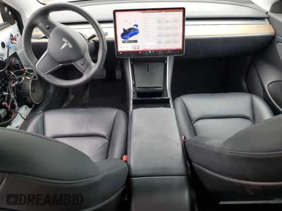 2020 Tesla Model 3 Long Range z VIN 5YJ3E1EB3LF667522, wystawiony jako Copart lot #57421145 z przebiegiem 77 821 mil mil oraz Szkoda całkowita • Salvage title. Historia ofert i sprzedaży dostępna na DreamBid. Obrazek 8.