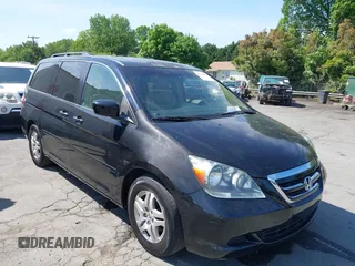 2006 Honda Odyssey EX-L with VIN 5FNRL38756B446740, listed as a IAAI auction lot 42114566 with 224,615 mi miles. Bid and sale history available at carsss.com. Image 1.