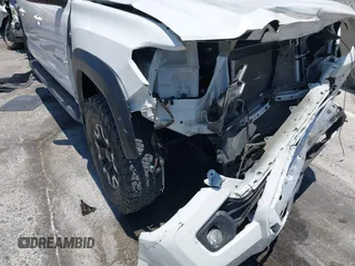 2021 Toyota Tacoma SR5 with VIN 3TMDZ5BN5MM118710, listed as a IAAI auction lot 42460278 with 60,310 mi miles and . Bid and sale history available at DreamBid. Image 17.