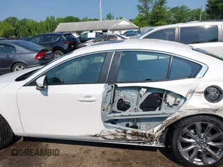 2022 Mazda 3 Carbon Edition with VIN 3MZBPACL0NM318573, listed as a IAAI auction lot 42403393 with 8,762 mi miles and . Bid and sale history available at DreamBid. Image 15.