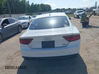 2016 Audi A7 Premium Plus with VIN WAUWGAFC2GN021696, listed as a IAAI auction lot 42595234 with 112,464 mi miles and . Bid and sale history available at DreamBid. Image 16.