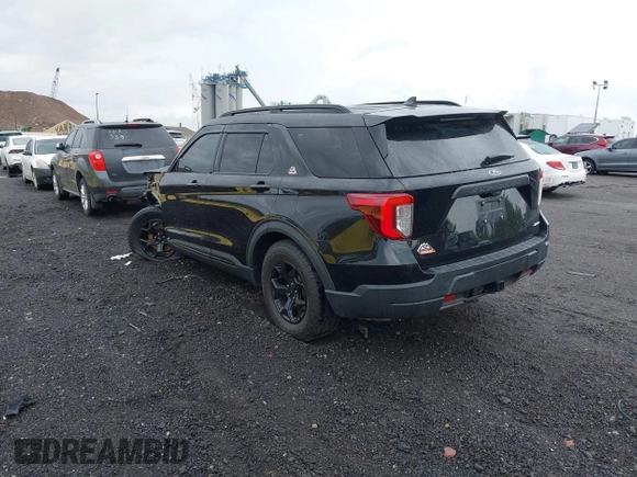 2022 Ford Explorer Timberline z VIN 1FMSK8JH0NGA82571, wystawiony jako IAAI lot #42244823 z przebiegiem 36 858 mil mil oraz . Historia ofert i sprzedaży dostępna na DreamBid. Obrazek 3.