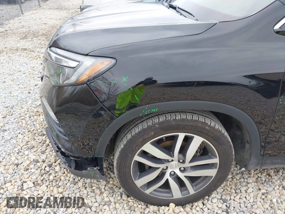 2017 Honda Pilot Touring with VIN 5FNYF6H90HB051700, listed as a IAAI auction lot 41902075 with 69,712 mi miles. Bid and sale history available at carsss.com. Image 19.