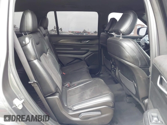 2023 Jeep Grand Cherokee Altitude with VIN 1C4RJJAG1P8902402, listed as a IAAI auction lot 42584202 with 13,913 mi miles and . Bid and sale history available at DreamBid. Image 8.