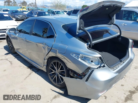 2023 Toyota Camry SE z VIN 4T1T11AK0PU833313, wystawiony jako IAAI lot #41743288 z przebiegiem 25 195 mil mil oraz . Historia ofert i sprzedaży dostępna na DreamBid. Obrazek 3.