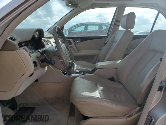 1999 Mercedes-Benz E-Class with VIN WDBJF82H9XX022535, listed as a Copart auction lot 86554534 with 140,904 mi miles and Salvage Title. Bid and sale history available at carsss.com. Image 7.