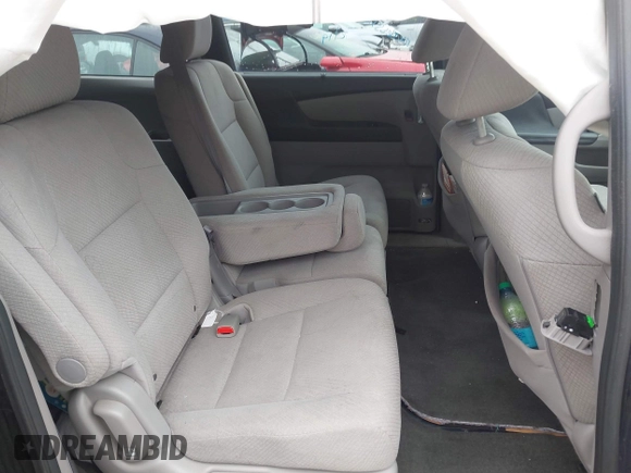 2016 Honda Odyssey SE with VIN 5FNRL5H38GB111448, listed as a IAAI auction lot 41754302 with 114,282 mi miles and . Bid and sale history available at DreamBid. Image 8.