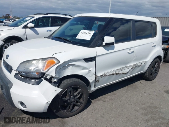 2011 Kia Soul + with VIN KNDJT2A21B7722613, listed as a IAAI auction lot 42054581 with 130,482 mi miles. Bid and sale history available at carsss.com. Image 6.