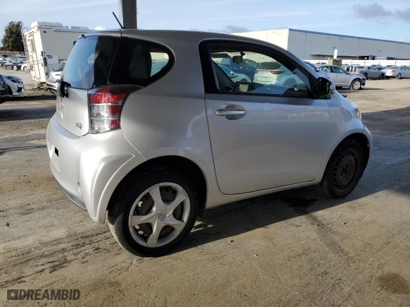 2015 Scion iQ with VIN JTNJJXB01FJ030680, listed as a Copart auction lot 46949235 with 27,509 mi miles and Salvage Title. Bid and sale history available at carsss.com. Image 3.