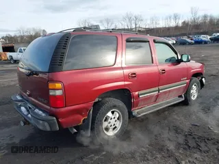 2001 Chevrolet Tahoe LT with VIN 1GNEK13TX1J281979, listed as a IAAI auction lot 41623086 with 297,509 mi miles. Bid and sale history available at carsss.com. Image 4.
