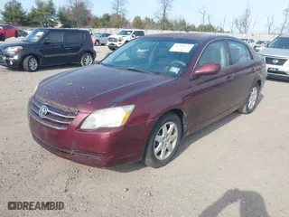 2005 Toyota Avalon XL with VIN 4T1BK36B25U057969, listed as a IAAI auction lot 41798579 with 241,831 mi miles. Bid and sale history available at carsss.com. Image 2.