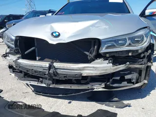 2016 BMW 7 Series 750i xDrive with VIN WBA7F2C52GG417733, listed as a IAAI auction lot 42040625 with 91,007 mi miles. Bid and sale history available at carsss.com. Image 6.