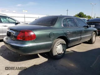 1998 Lincoln Continental with VIN 1LNFM97V8WY707809, listed as a Copart auction lot 70842654 with 175,066 mi miles and Salvage Title. Bid and sale history available at carsss.com. Image 3.