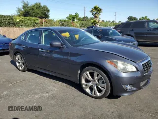 2011 Infiniti M with VIN JN1BY1AP3BM325629, listed as a Copart auction lot 58600135 with 132,635 mi miles and Salvage title. Bid and sale history available at DreamBid. Image 4.