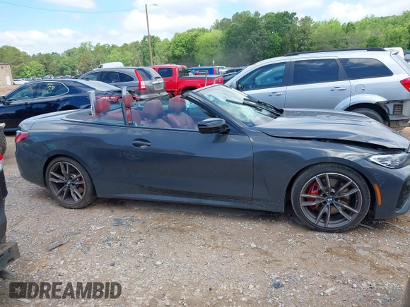 2021 BMW 4 Series M440i with VIN WBA53AT05MCG89665, listed as a IAAI auction lot 42319456 with Not provided miles and . Bid and sale history available at DreamBid. Image 13.